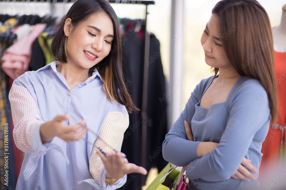 Beautiful Asian women shop in stores with female salespeople. Beautiful Asian women shop in stores with female salespeople.