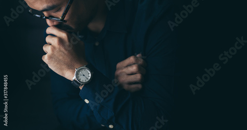 looking at luxury watch on hand check the time at workplace.concept for managing time organization working,punctuality,appointment.fashionable wearing stylish