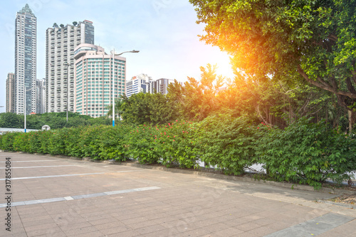 empty, modern square and skyscrapers in modern city