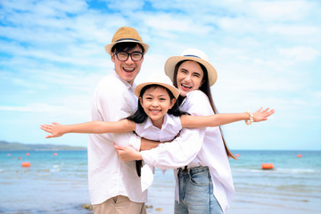 Happy family on the beach