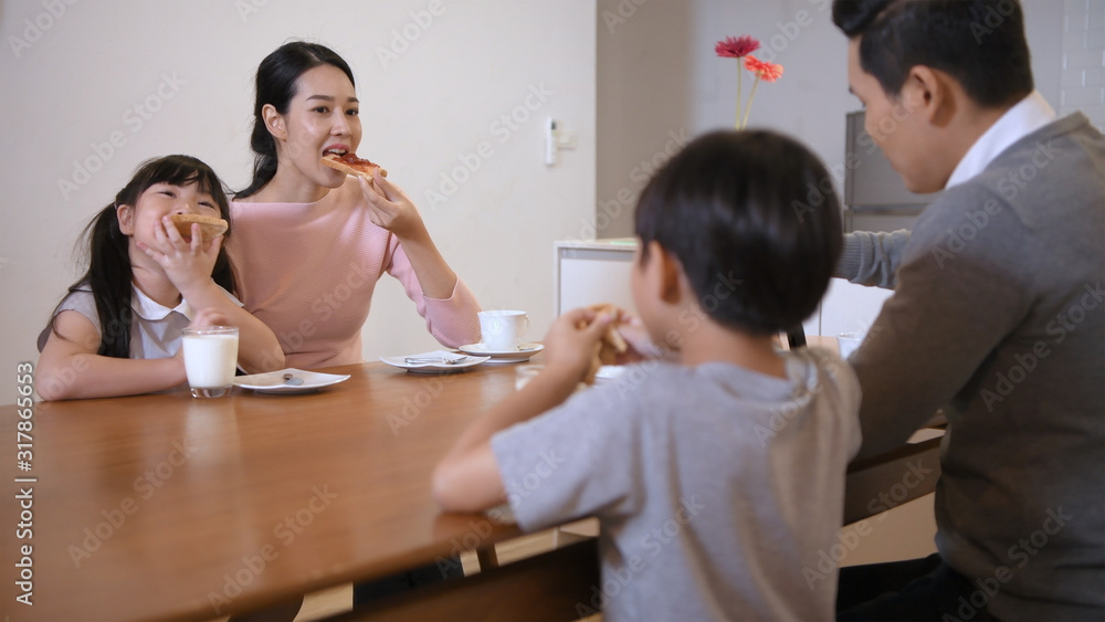 Holiday concept. Family eating breakfast together in the kitchen. 4k Resolution. Holiday concept. Family eating breakfast together in the kitchen. 4k Resolution.
