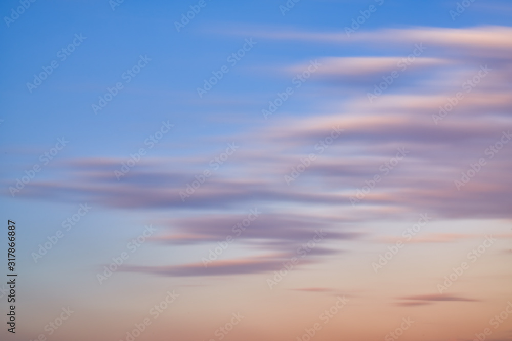 abstract cloudscape flow movement in sunset skyline