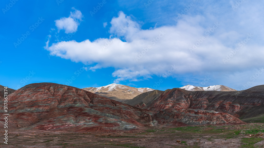 Panoramic wide angle view of the beautiful striped red mountain
