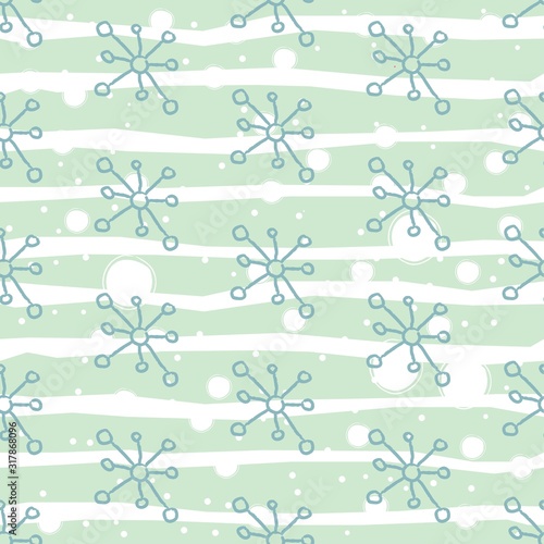 Seamless pattern with hand drawn snowflakes