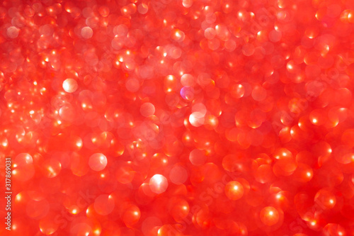 Red shiny glitter abstract texture background.