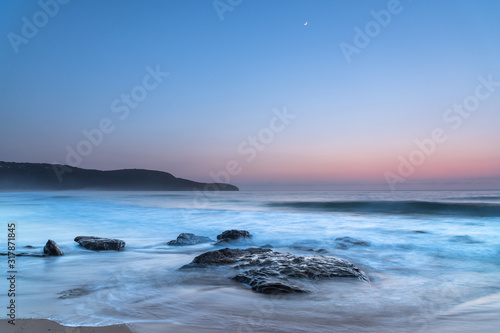 Iridescent Blue Dawn Seascape with Crescent Moon © Merrillie