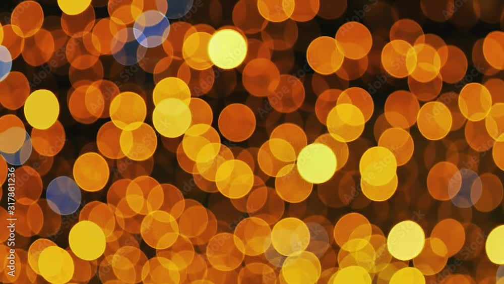 Light spots blinks on yellow garland, bokeh stylish background Light spots blinks on yellow garland, bokeh stylish background