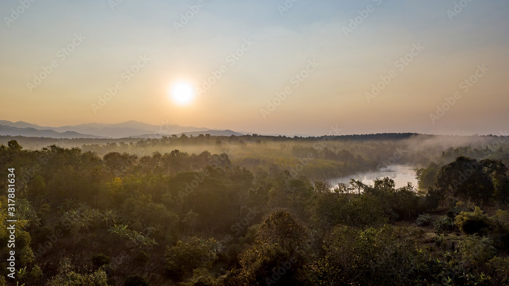 Panorama view of countryside forest and mountains when sunrise. Panoramic image.