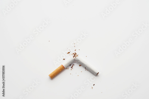 Obraz na płótnie Broken cigarette on white background , World No Tobacco Day Tobacco and lung health concept . w salonie
