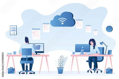 Exchanging files. Two modern workplace, businesspeople upload and download documents