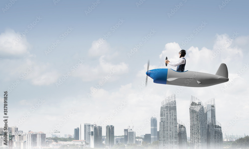 Businessman in aviator hat and goggles Businessman in aviator hat and goggles