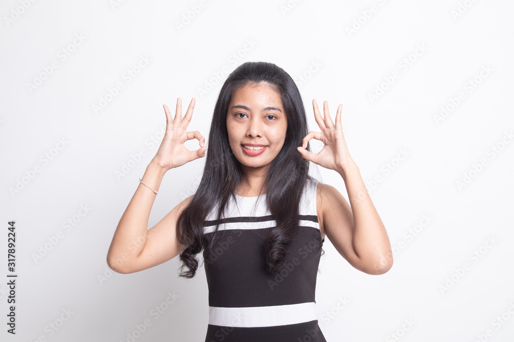 Asian woman show double OK hand sign and smile. Asian woman show double OK hand sign and smile.