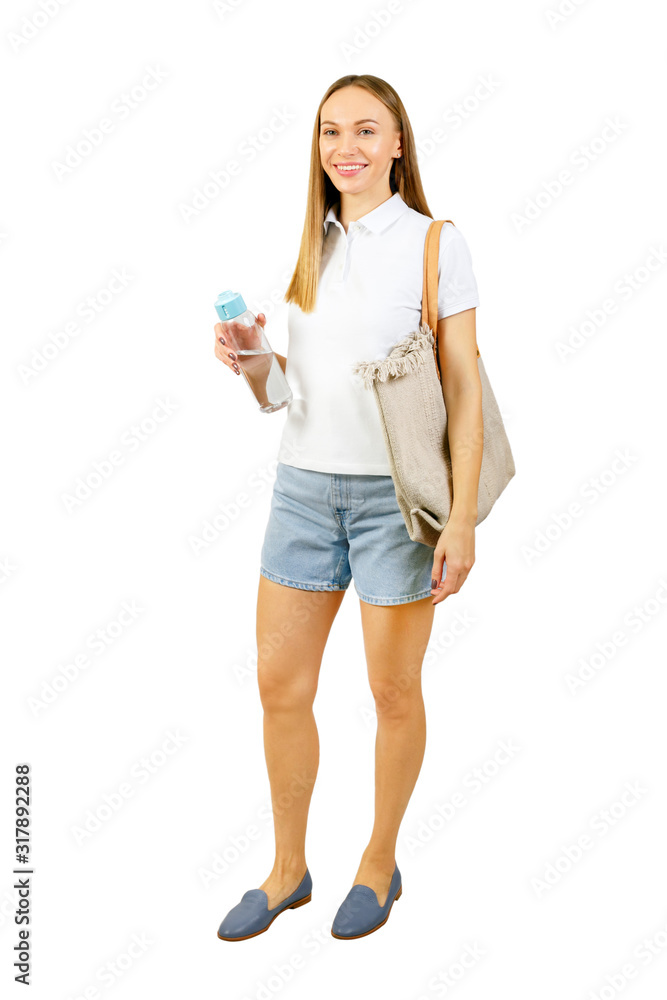 Wearing stylish summer clothes. Young beautiful woman drinking water isolated over white background. Wearing stylish summer clothes. Young beautiful woman drinking water isolated over white background.