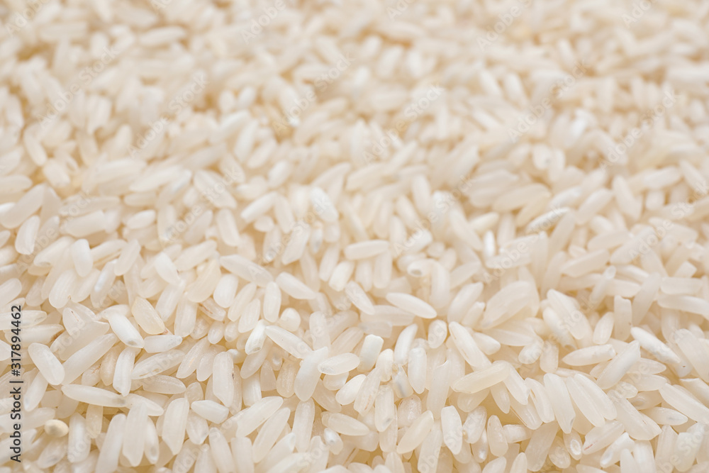 Pile of polished rice as background, closeup Pile of polished rice as background, closeup