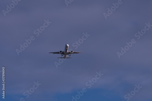 Close view to landing passenger jet