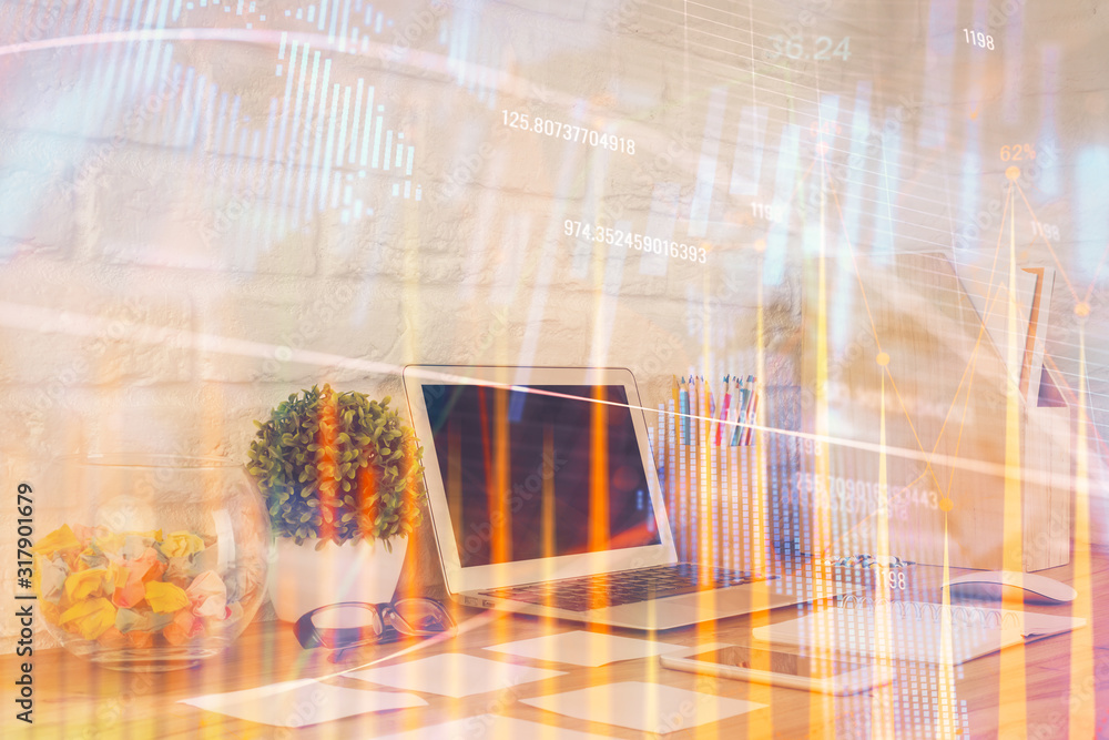 Forex market graph hologram and personal computer on background. Double exposure. Concept of investment.