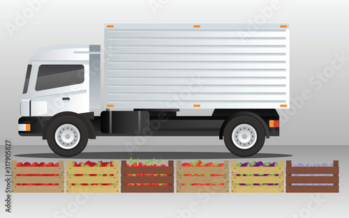 Trucks and fruit boxes in the market	