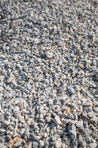 Large pile of rough rock gravel