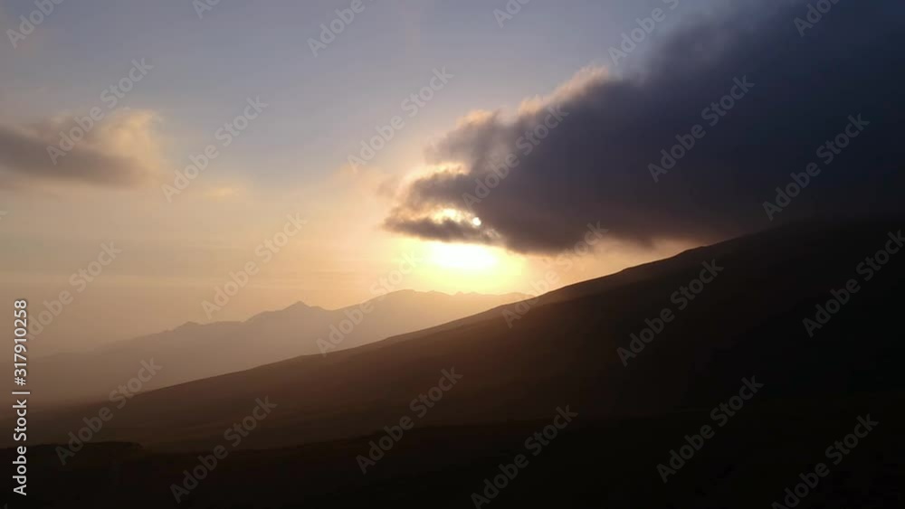 Golden Backlit Sunset Near Misti Volcano In Peru. Aerial Pan Left Golden Backlit Sunset Near Misti Volcano In Peru. Aerial Pan Left