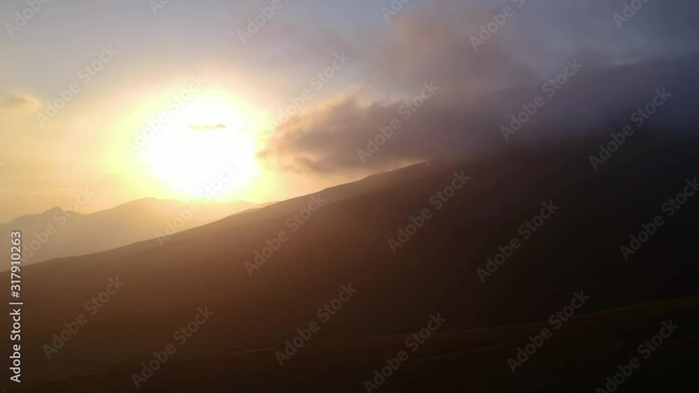 Golden Backlit Sunset Near Misti Volcano In Peru. Aerial Pan Right Golden Backlit Sunset Near Misti Volcano In Peru. Aerial Pan Right