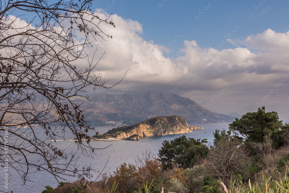 Breathtaking, Stunning Panoramic Landscape View from Mogren Fortress, on St. Nikola Island ( Hawaii Island) Montenegro, Adriatic Sea, Budva, with golden sunshine light at twilight