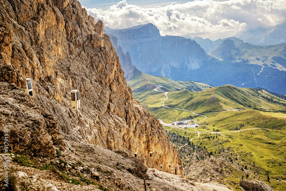 Looking down to the Sella Pass from the trail up to Forcella del Sassolungo / Langkofel Col  in the Dolomite Alps, South Tyrol, Italy