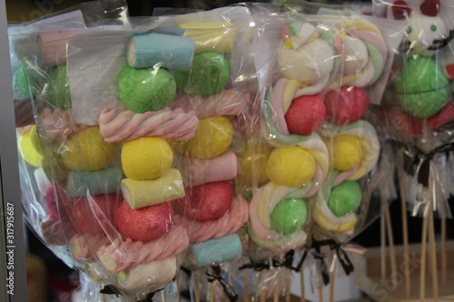 Colorful marshmallow candy sticks in a bakery photo