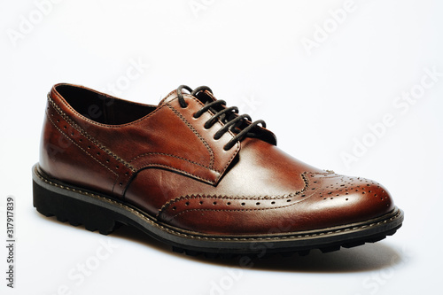 brown leather shoes on a white background