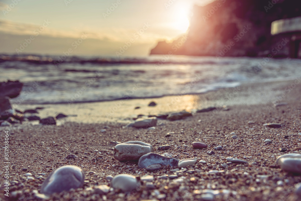 Sea scape with rocks, long exposure.Tropical rocky beach at sunset, located in Budva, Montenegro, Adratic sea.