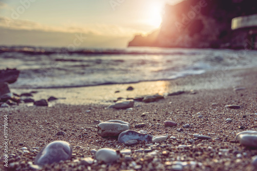 Obraz na płótnie Sea scape with rocks, long exposure.Tropical rocky beach at sunset, located in Budva, Montenegro, Adratic sea. w salonie