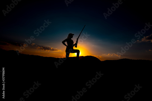 Hunters and rifle silhouette women © blackdiamond67