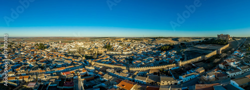 Aerial panorama view of Belmonte castle in Cuenca province Spain with long stretching city walls topped with battlements © tamas