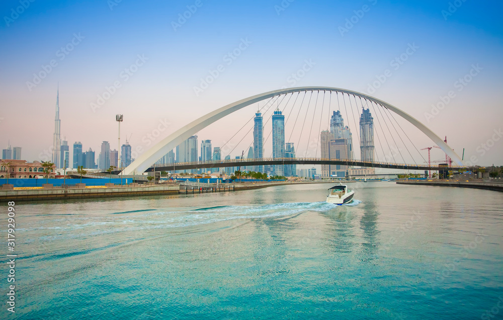 Fototapeta premium Tolerance bridge and boat in Dubai city, UAE