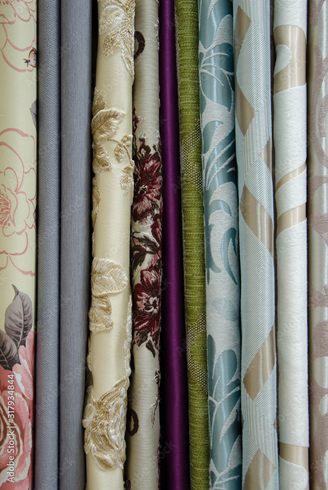 Cuts of fabrics of different colors on a hanger Cuts of fabrics of different colors on a hanger