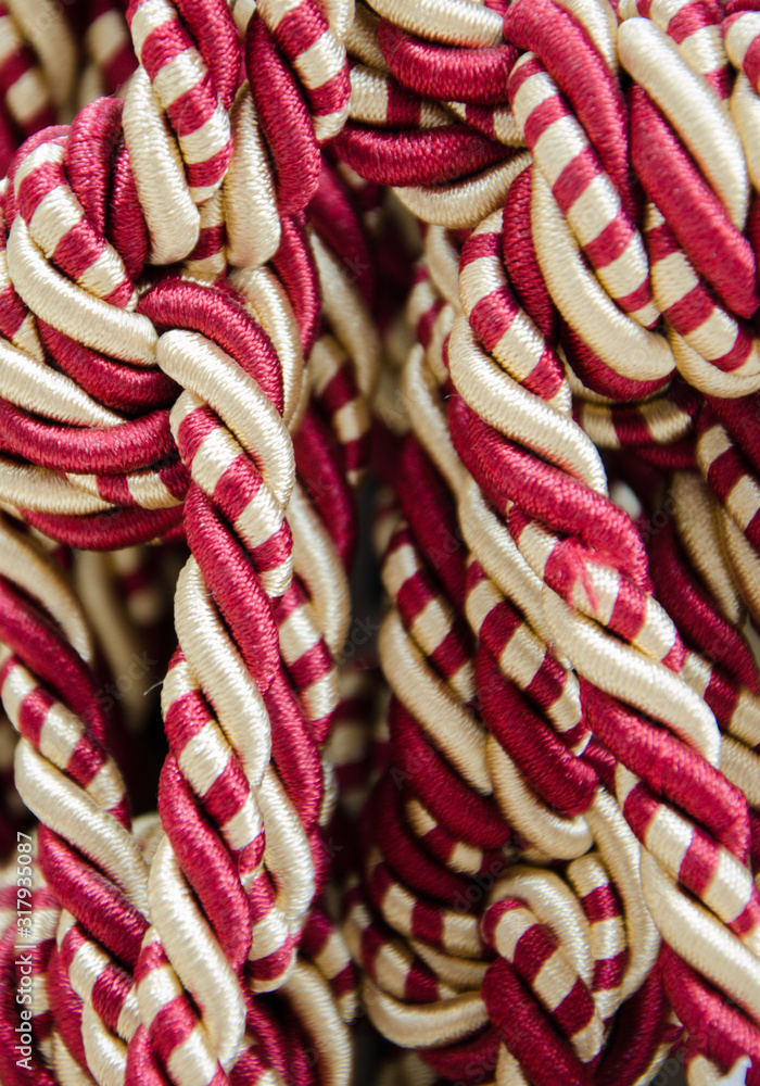 Multi-colored woven and twisted threads Multi-colored woven and twisted threads
