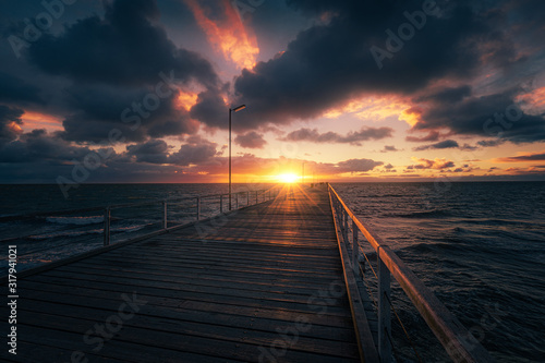 Fototapeta Naklejka Na Ścianę i Meble -  Sunset at Semaphore jetty, Adelaide, Australia