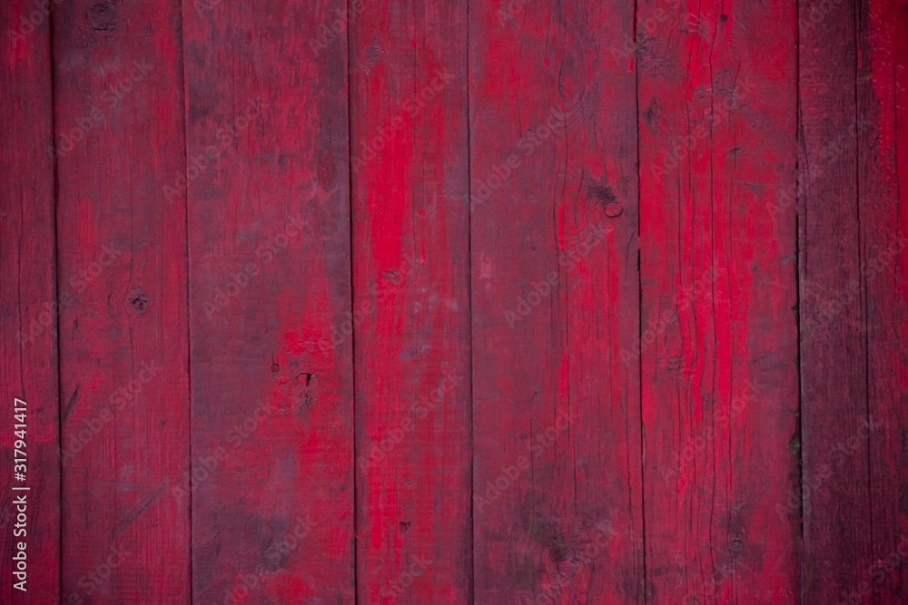red, vinous, maroon vertical wood fence. wallpaper. background red, vinous, maroon vertical wood fence. wallpaper. background