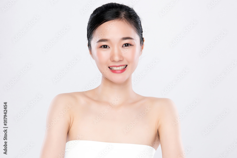 Beautiful Young Asian Woman with Clean Fresh Skin. Face care, Facial treatment, on white background, Beauty and Cosmetics Concept. Beautiful Young Asian Woman with Clean Fresh Skin. Face care, Facial treatment, on white background, Beauty and Cosmetics Concept.