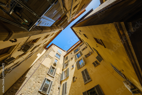 Narrow street of the historic center of Florence, Italy