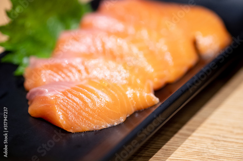 Salmon sashimi fresh and raw salmon fish slice ready to eat