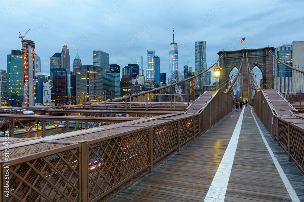 People walking in Brooklyn bridge at day time People walking in Brooklyn bridge at day time