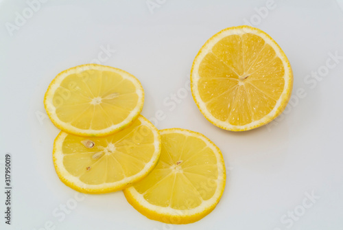 Slices of lemon with white background 