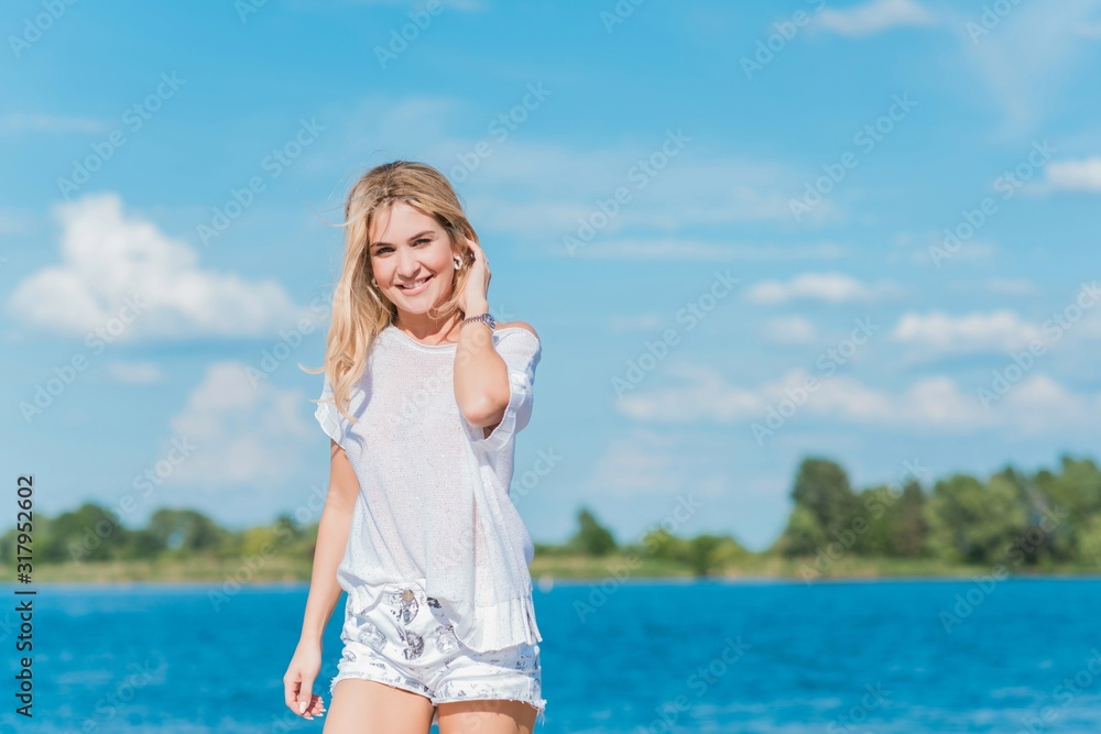 fashion, carefree, trip, palm, tourist, tanned, sunglasses, lounge, people, tanning, sunbathing, shore, smilePretty nice young woman in fashionable clothes rest at the beach, vacation and trip concept fashion, carefree, trip, palm, tourist, tanned, sunglasses, lounge, people, tanning, sunbathing, shore, smilePretty nice young woman in fashionable clothes rest at the beach, vacation and trip concept