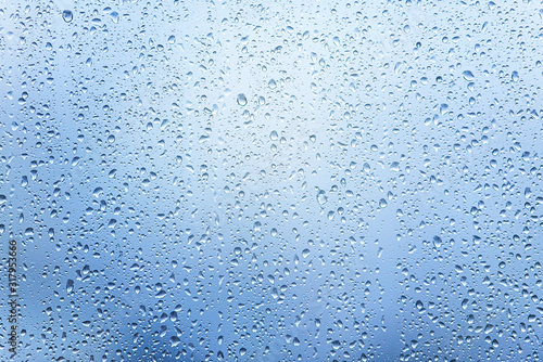 Window with Drops after heavy Rain, Water Drops on Glass as Background or Texture