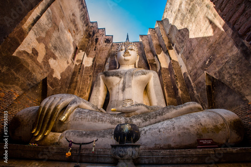Background Unseen tourist attractions in Thailand  Big Buddha statue in Wat Si Chum  in Sukhothai province  tourists always come to see the beauty.