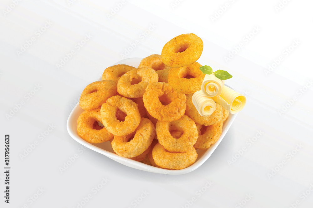 Pile of crispy Masala Corn ring, Cream & Chilli snack (Fryums - Frymus) in white dish isolated on white background, Sweet brekfast cereal rings - Image Pile of crispy Masala Corn ring, Cream & Chilli snack (Fryums - Frymus) in white dish isolated on white background, Sweet brekfast cereal rings - Image