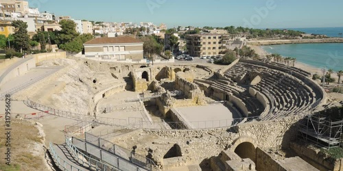 Ancient roman amphitheater of Tarragona, Spain, next to the Mediterranean sea in Costa Dorada, Catalonia, Spain.The Archaeological Ensemble of Tarraco is declared a UNESCO World Heritage Site Ref 875 photo