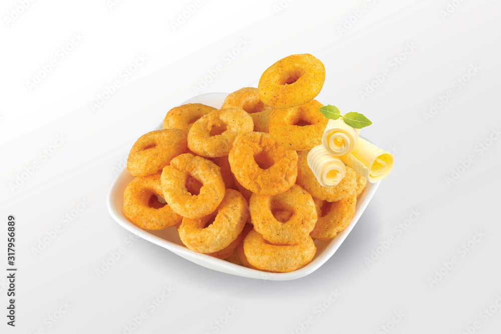 Pile of crispy Masala Corn ring, Cream & Chilli snack (Fryums - Frymus) in white dish isolated on white background, Sweet brekfast cereal rings - Image Pile of crispy Masala Corn ring, Cream & Chilli snack (Fryums - Frymus) in white dish isolated on white background, Sweet brekfast cereal rings - Image