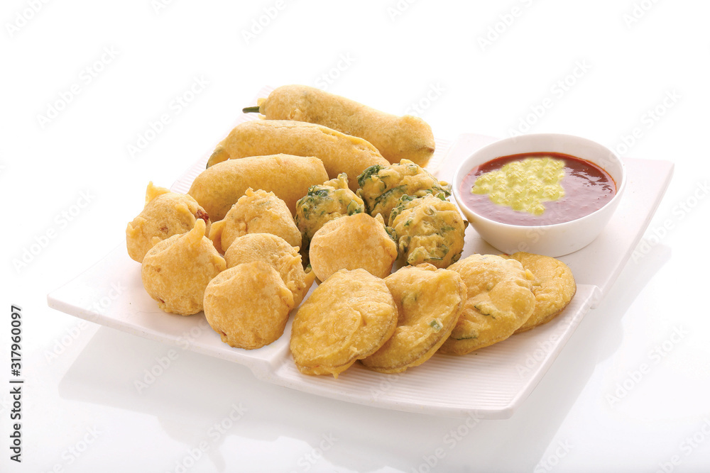Methi Gota (fenugreek) Pakoda, Chili pakoda, potato pakoda (vada) or Fritters indian food snack, bhajiya, white background, photographi - Image Methi Gota (fenugreek) Pakoda, Chili pakoda, potato pakoda (vada) or Fritters indian food snack, bhajiya, white background, photographi - Image