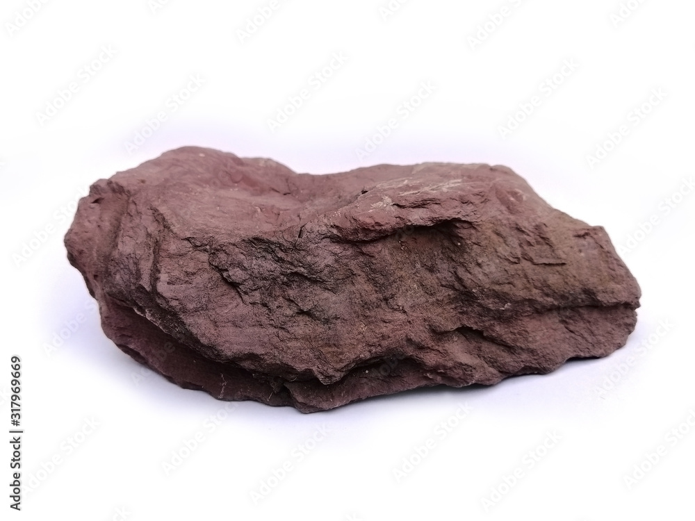 Shale is a very fine grained sedimentary rock. There are mud elements that contain mineral ores with mineral debris. Especially Quartz and Calcite. Shale isolated on white background. Shale is a very fine grained sedimentary rock. There are mud elements that contain mineral ores with mineral debris. Especially Quartz and Calcite. Shale isolated on white background.
